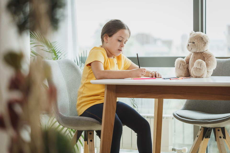 A child learning at The Kent City School
